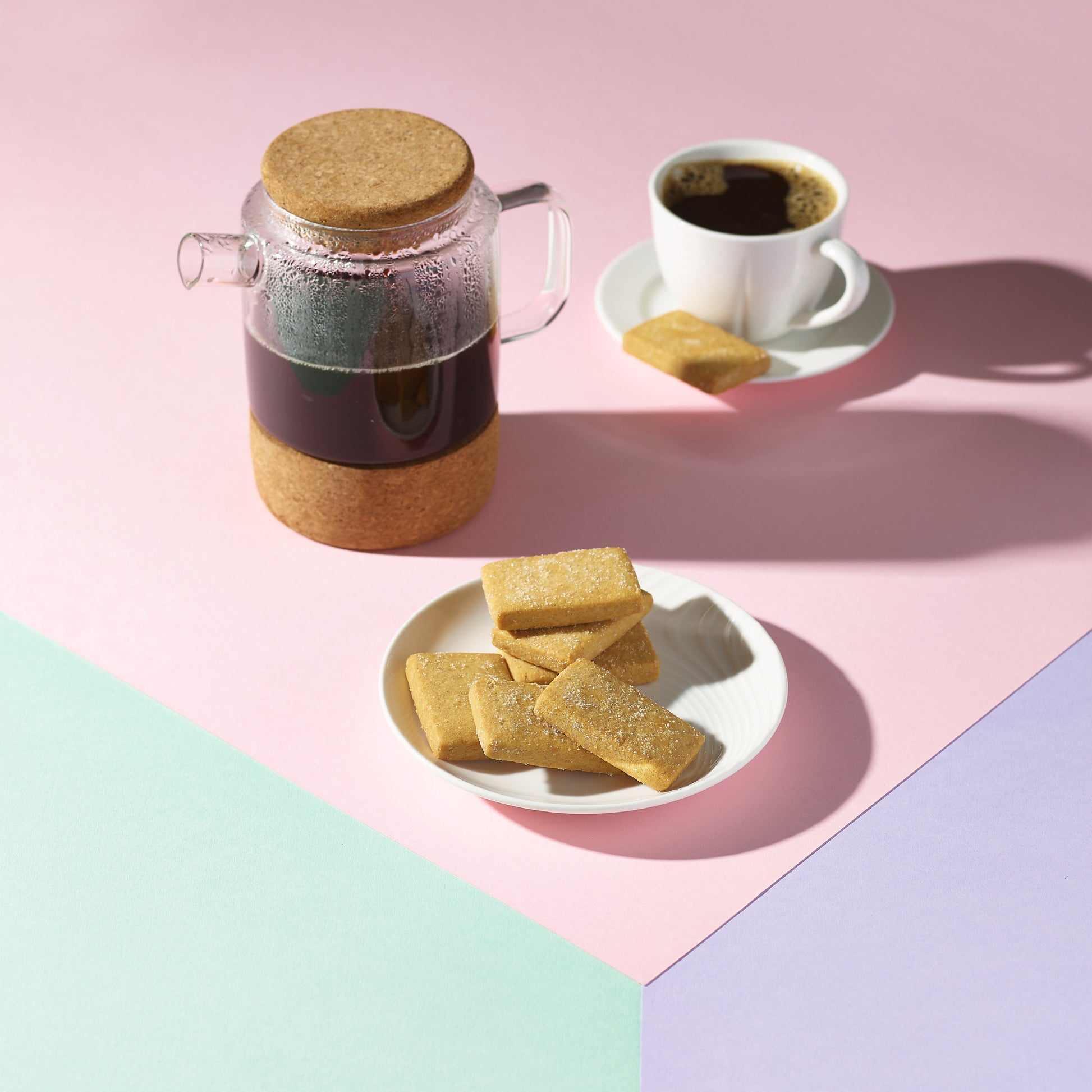 shortbread on plate with filter coffee jar and cup